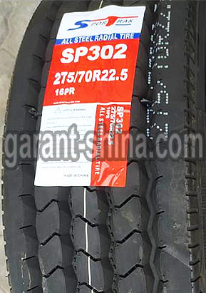 SporTrak SP302 (универсальная) 275/70 R22.5 148/145M 16PR - Фото шины с этикеткой вблизи